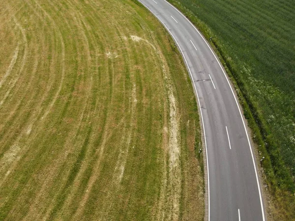 Drone View Curved Asphalt Road White Stripes Grass Fields Landscape — Stock Photo, Image