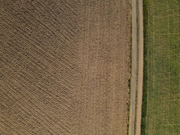 Αεροφωτογραφία Γεωργικής Γης Αγροτεμάχιο Χωμάτινο Χωράφι Και Χωματόδρομο — Φωτογραφία Αρχείου