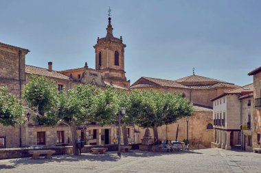 Town of Santo Domingo de Silos. Main square and in the background the monastery. In the province of Burgos. Spain