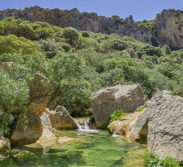 stock image River passing in the Cerrada de Utrero in Sierra Cazorla, Segura y Las Villas Natural Park. Declared a Biosphere Reserve by UNESCO. Located in the province of Jaen, Andalusia, Spain