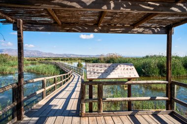 Bird observatory in The Hondo of Elche natural park, in a sunny day. In Elche, Alicante, Valencian community, spain. clipart