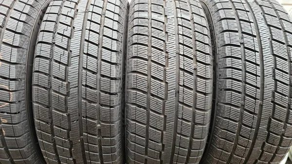 The tread on car tires is necessary for safe driving on the roads.
