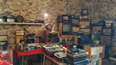 Many TV receivers and tape recorders of the last century in the Latvian Biksere Manor in autumn 2020.