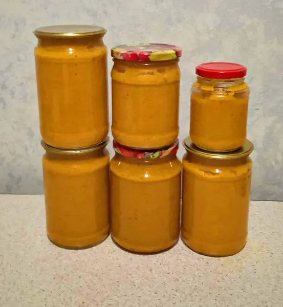 Delicious squash caviar is preserved in jars for the winter.