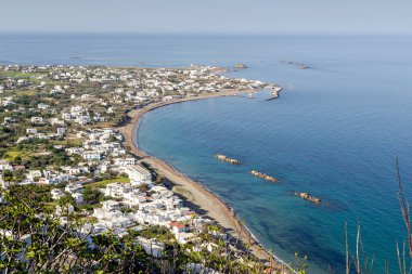 Panoramic view of the resort town of Chora and sea (Northern Sporades, Skyros island, Greece) in spring, sunny day. clipart