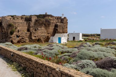 Picturesque, ancient, small, orthodox church of St. Nicholas in the rock on the island of Skyros (Greece) on a sunny spring day