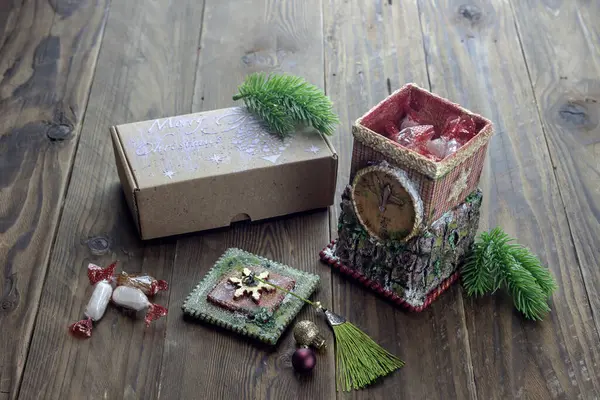 Decoration of a New Year or Christmas in the form of a box of sweets close-up
