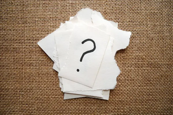 Collection of question mark paper. Torn paper with question mark on copy space background