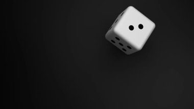 Siyah bir yüzey üzerinde yuvarlanan tek bir zarın 3 boyutlu videosu. Kumarhane ve kumar teması için ideal iki siyah noktayla 2 numarada duruyor..