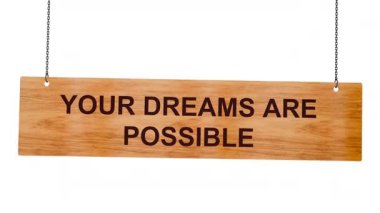 Biz senin rüyalarınızız. Ahşap duvarda asılı bir tabela.
