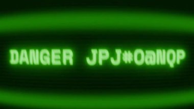 Old green CRT screen showing text DANGER IMMINENT! appearing in random glitch and coding style