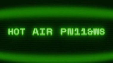 Old green CRT screen showing text HOT AIR BALLOON appearing in random glitch and coding style