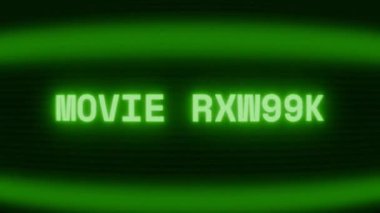 Old green CRT screen showing text MOVIE REVIEW appearing in random glitch and coding style