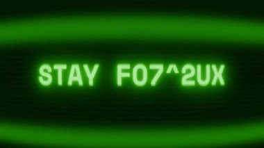 Old green CRT screen showing text STAY FOCUSED appearing in random glitch and coding style