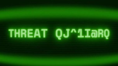 Old green CRT screen showing text THREAT DETECTED appearing in random glitch and coding style