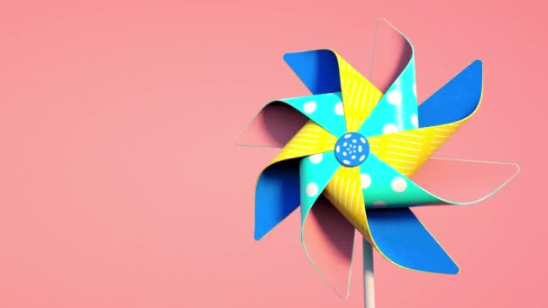 Nahtlose Animation Mehrfarbiges Windrad Das Sich Einer Schleife Auf Rosa — Stockvideo