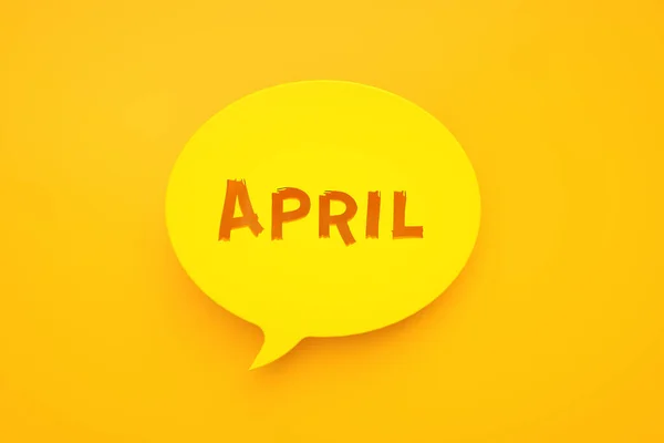 Speech Bubble Inscription April Yellow Background Render — Stock Photo, Image