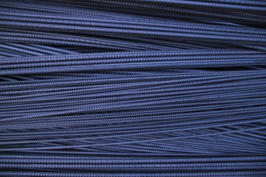 Close-up of blue steel wire for construction and industrial background. Selective focus