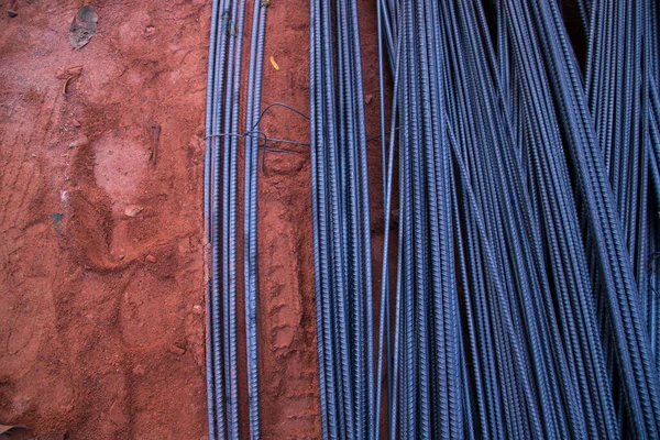 Pile of steel wire on the construction site. Steel wire background.