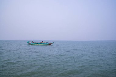 Landscape view of Traditional Travel Boat in the Padma river - Bangladesh