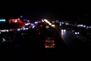 Renkli Defocus soyut bokeh ışık efektleri gece siyah arkaplan dokusu üzerinde