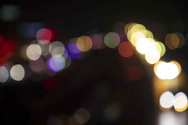 stock image Colorful Defocus Abstract bokeh light effects on the night black background texture