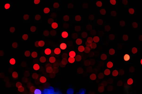 Red Defocus Abstrakt Bokeh Ljus Effekter Natten Svart Bakgrund Konsistens — Stockfoto