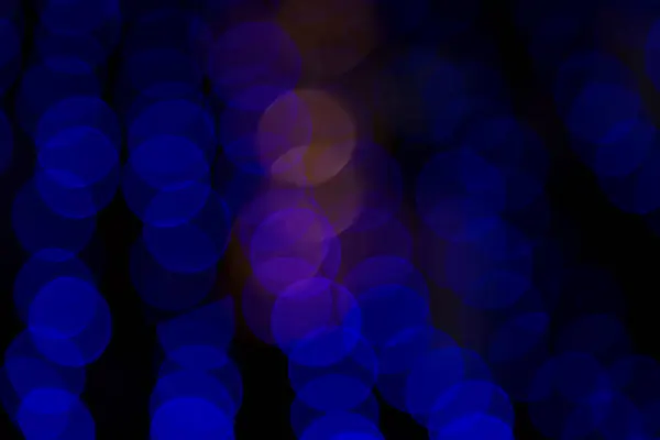 カラフルなDeocus抽象Bokeh光効果路上夜黒の背景テクスチャ壁紙 — ストック写真