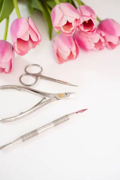 stock image Manicure Tools On White Background With Pink Blur