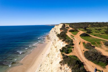 Algarve Region Portugal. Lagos looking over to Praia Da Luz Beach. Beautiful Blue Skies