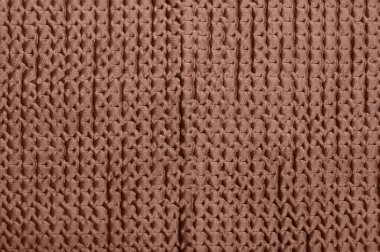 Knitted fabric texture in mocha-mousse shade, detailed surface pattern. clipart