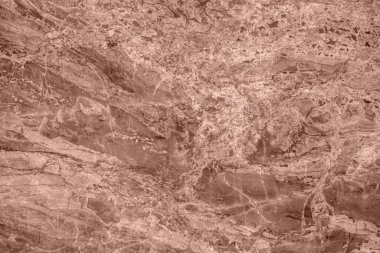 Close-up of natural granite in Pantones 2025 color Mocha-Mousse, featuring detailed veining. clipart