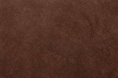 Kahverengi kadife kumaş dokusu ince detaylarla, Pantones Mocha Mousse 'u temsil ediyor..