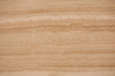 Close-up of beige stone texture with light brown and tan layers, showcasing its natural, earthy appeal. clipart