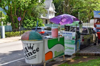 Port of Spain, Trinidad and Tobago- August 8, 2023- A sno cone or snow cone cart at the Queen's Park Savannah.  clipart