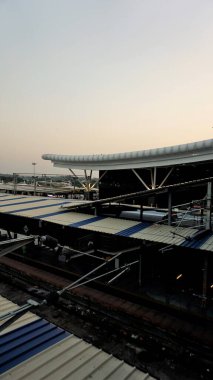 Bangalore,Karnataka,India-October 26 2022: Interior architecture of within the pemises of Sir M Visvesvaraya Terminal or SMVB premises at golden hour at evening. Indian Railway station located in Baiyyapanahalli, Bangalore.