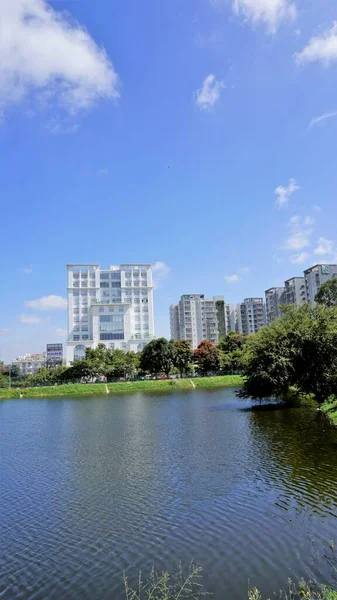 stock image Bangalore,Karnataka,India-September 18 2022: Beautiful view of garden city aka Bangalore with Lakes, infrastructure with green cover awnd clear sky