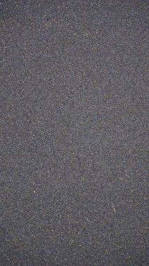 Muttom Sahili, Kanyakumari Bölgesi, Tamilnadu 'da sarı ve siyah taneciklerden oluşan güzel kum desenleri.