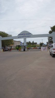 Nagercoil,Tamilnadu,India - December 03 2024: Entrance of Christopher Bus Stand in Vadasery,Nagercoil with buses and people. Spacious and clean stand clipart