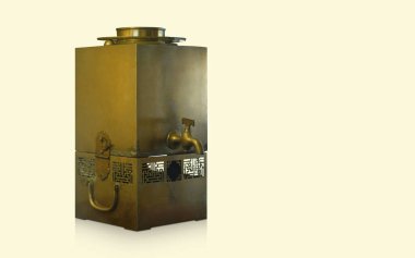 antique brass water bottle square shape on yellow background, object, ancient, decor, gift, copy space