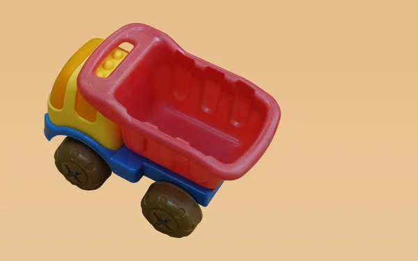 Widok Góry Kolorowe Plastikowe Ciężarówki Zabawki Pomarańczowym Tle Obiekt Zabawka — Zdjęcie stockowe