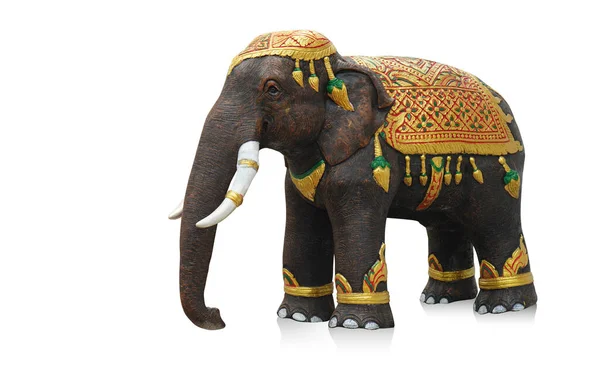 サイドビュー白の背景に茶色と黒の象の木の彫刻 オブジェクト 贈り物 ファッション コピースペース ストック写真