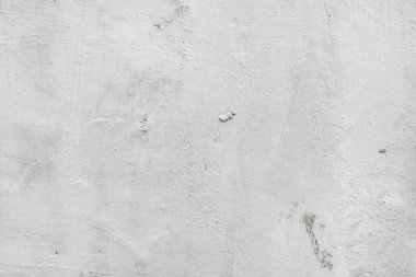 Beyaz alçılı duvar arkaplan dokusu çimento. Soyut gri renk tasarımı ile kirli gri beyaz arkaplan ile hafiftir..