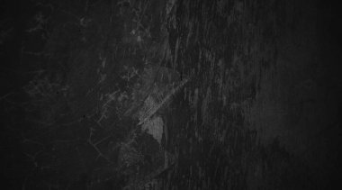 Doğal boya fırçası vuruşunun siyah duvar arkaplanı çimento ya da taş kadar eski. somut doku korku ve cadılar bayramı kavramı olarak