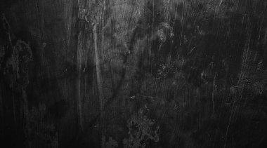 Doğal boya fırçası vuruşunun siyah duvar arkaplanı çimento ya da taş kadar eski. somut doku korku ve cadılar bayramı kavramı olarak