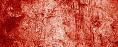 Kırmızı boya lekeleri taze kanı andırıyor. Tırtıklı kenarları rahatsızlık hissi veriyor. Lekeler, Cadılar Bayramı dehşetini hatırlatıyor..