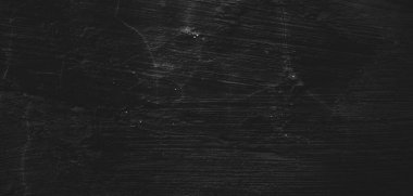 Doğal boya fırçası vuruşunun siyah arkaplanı çimento desenli ya da taş kadar eski. Dehşet çimento dokusu. Korkunç bir geçmişi var. Duvar Betonu Yaşlı siyah