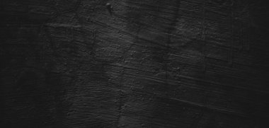 Doğal boya fırçası vuruşunun siyah arkaplanı çimento desenli ya da taş kadar eski. Dehşet çimento dokusu. Korkunç bir geçmişi var. Duvar Betonu Yaşlı siyah