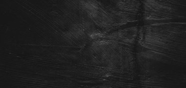 Doğal boya fırçası vuruşunun siyah arkaplanı çimento desenli ya da taş kadar eski. Dehşet çimento dokusu. Korkunç bir geçmişi var. Duvar Betonu Yaşlı siyah