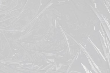 Plastik kırışık, beyaz plastik veya polietilen çanta dokusu, makro, beyaz arkaplan